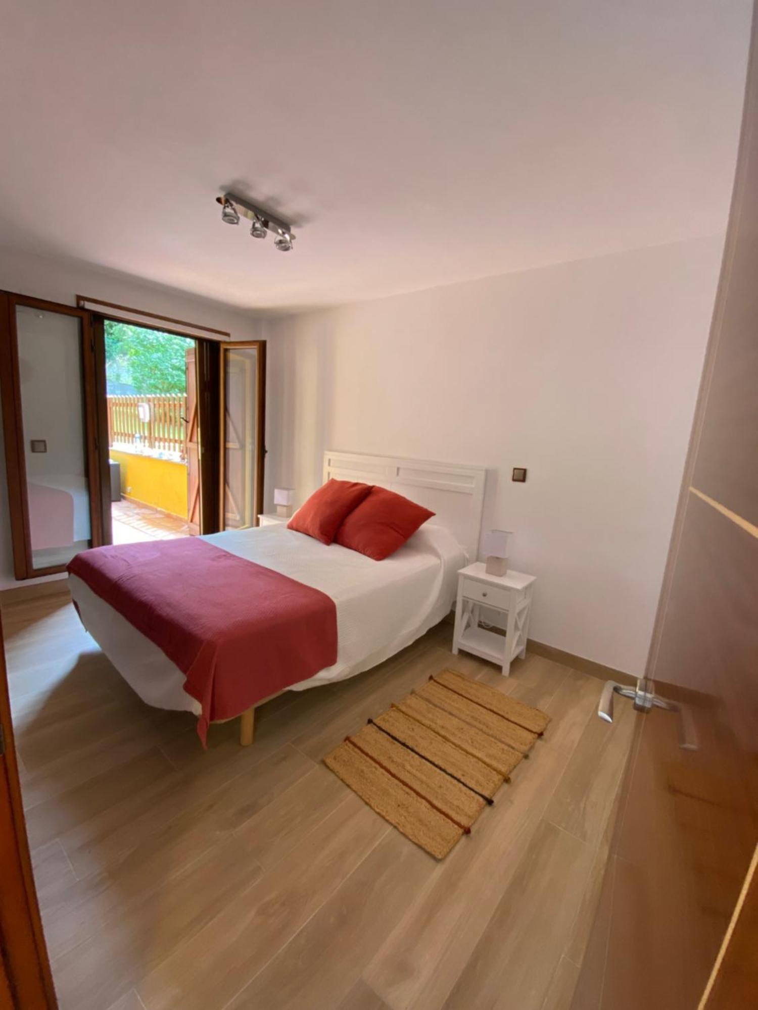 Chalet En Комильяс Экстерьер фото